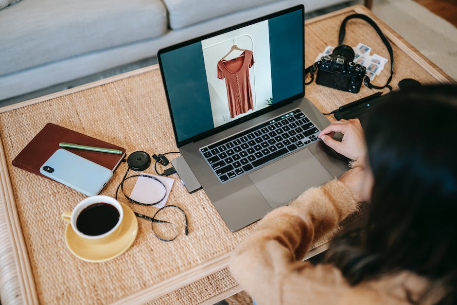 A Dell charger beside a laptop, ready to power your device and keep it running smoothly.