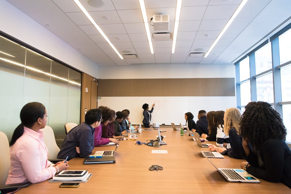 A group of people in a virtual meeting, representing successful collaboration.